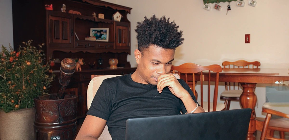 boy thinking and studying at home